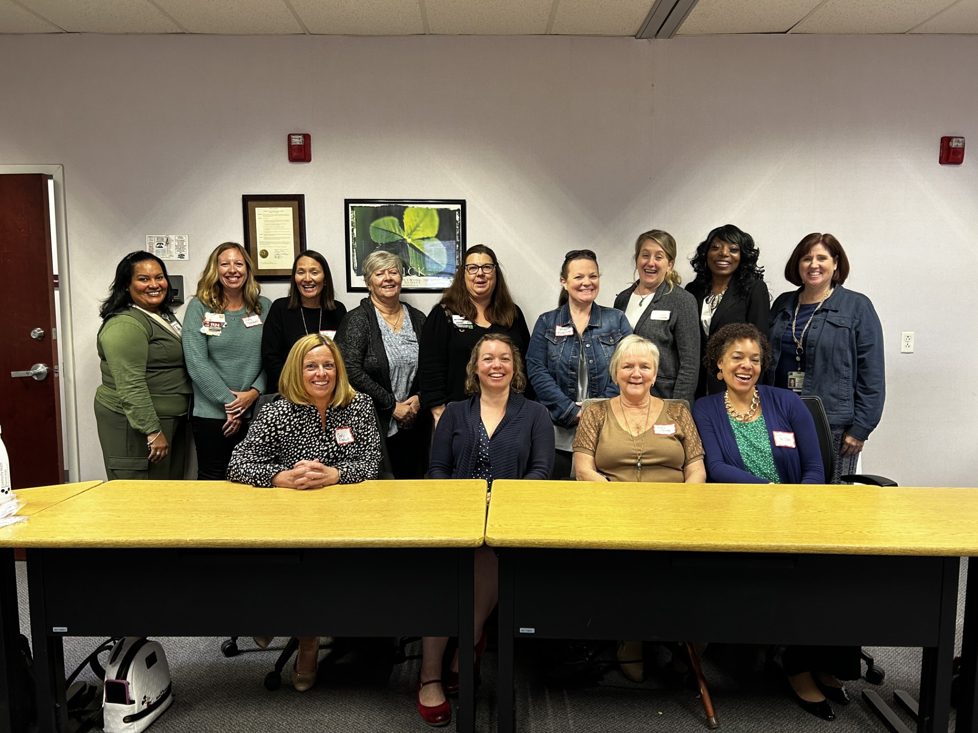 Image shows a collection of InJAC members posing for the camera