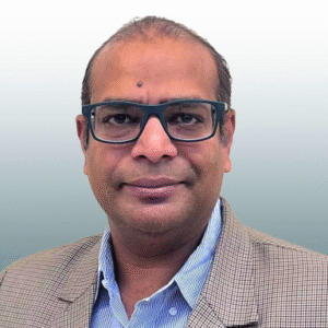 Dr. Agarwal smiles in his headshot.