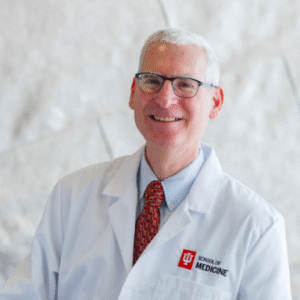 Michael Weiss smiles in his headshot.